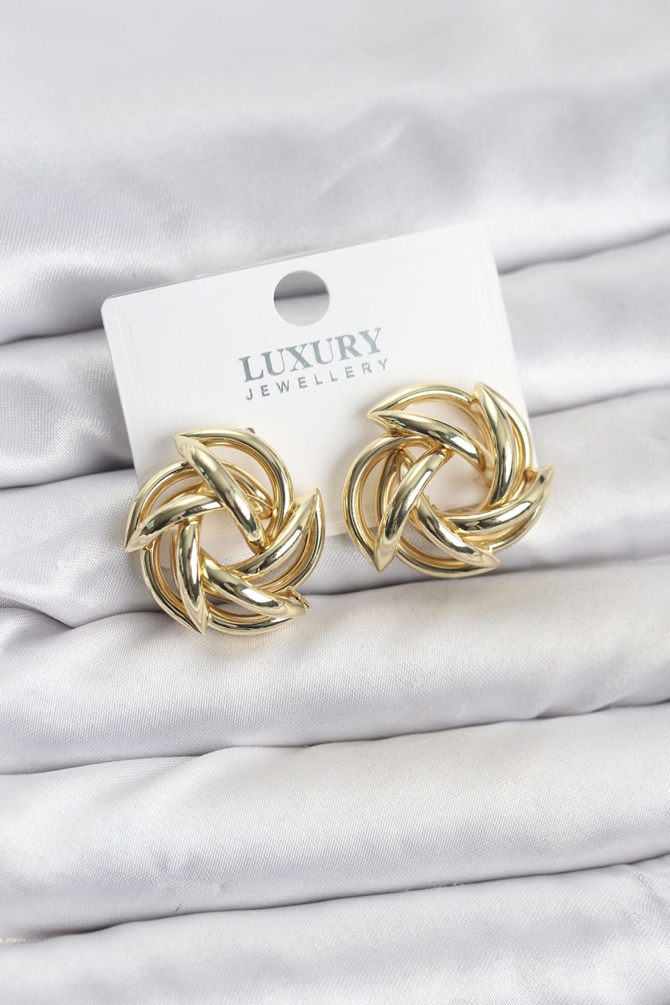 Shekka Gold Renk Pirinç Keskin Sarmal Model Kadın Küpe